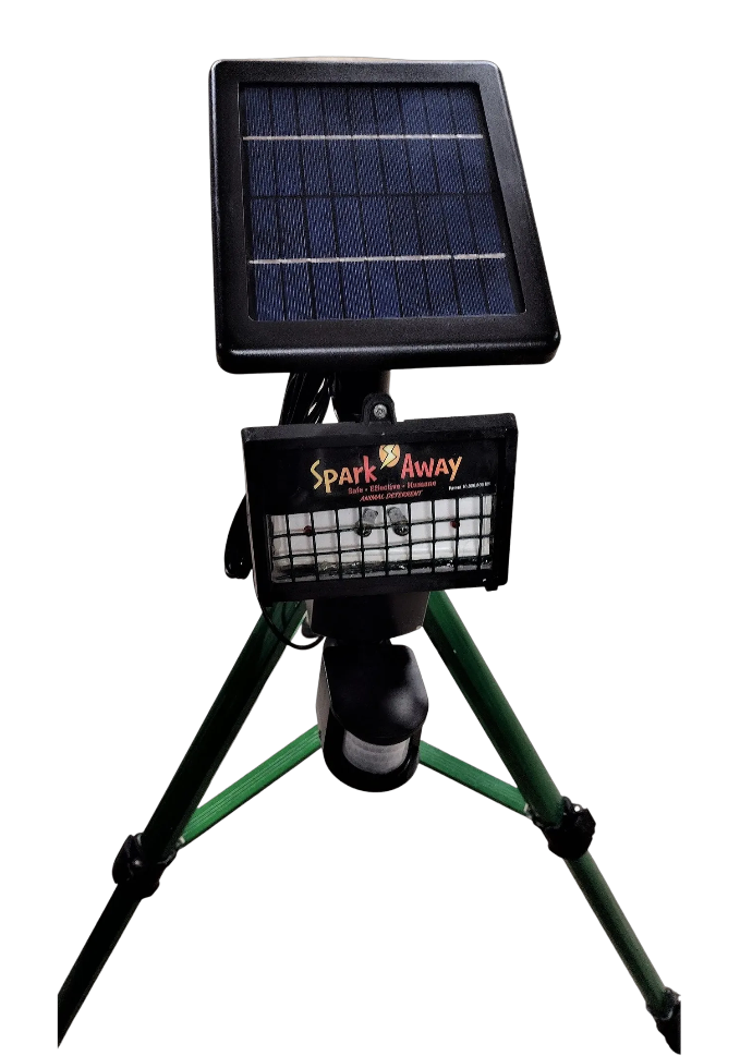 Spark Away Animal Deterrent set up on our Tripod with a Solar Accessory attached.